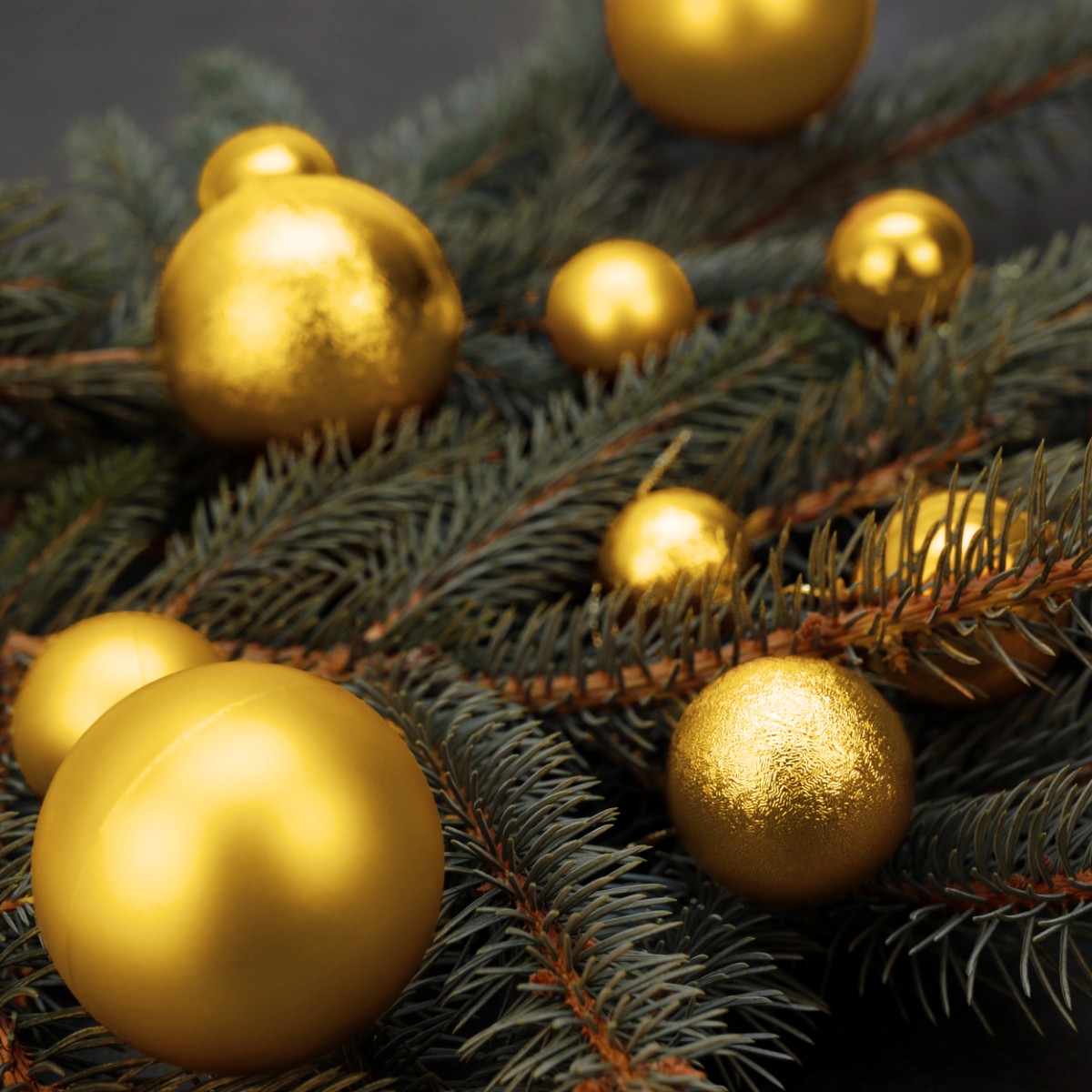 Bombki choinkowe złote na gałązce choinkowej. - ujęcie 2